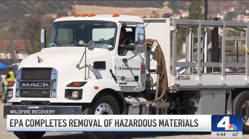 Screen capture from NBC Los Angles showing a large white construction truck hauling material at the EPA hazardous waste site