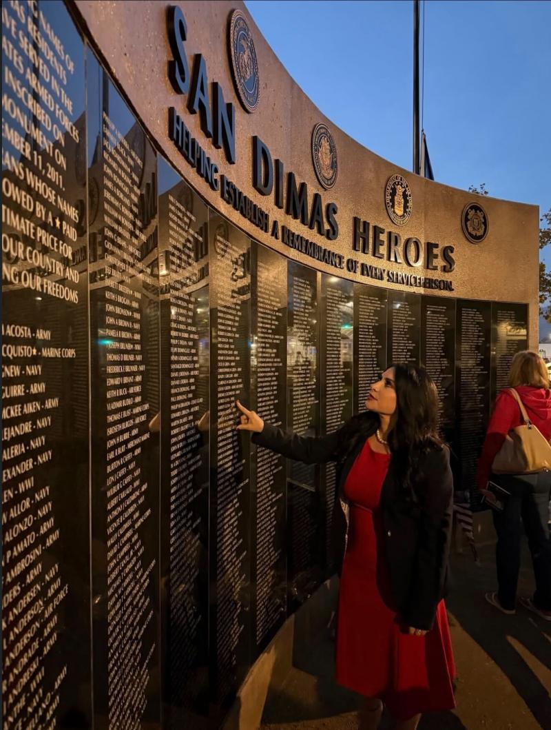 Senator Susan Rubio Admiring Wall Honoring Veterans in San Dimas